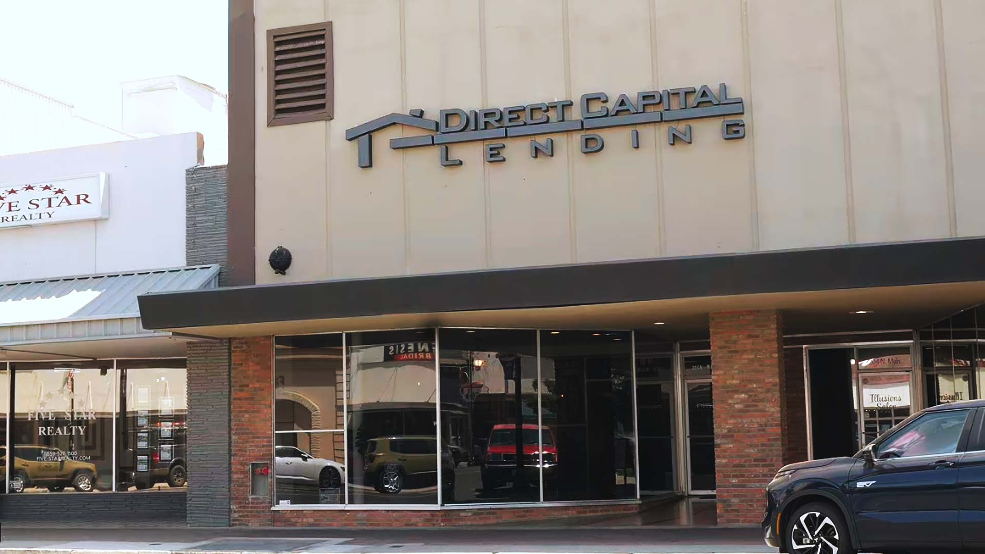 The storefront exterior of the Direct Capital Lending office on Main Street in Porterville, California, showcasing a trusted local mortgage brokerage.